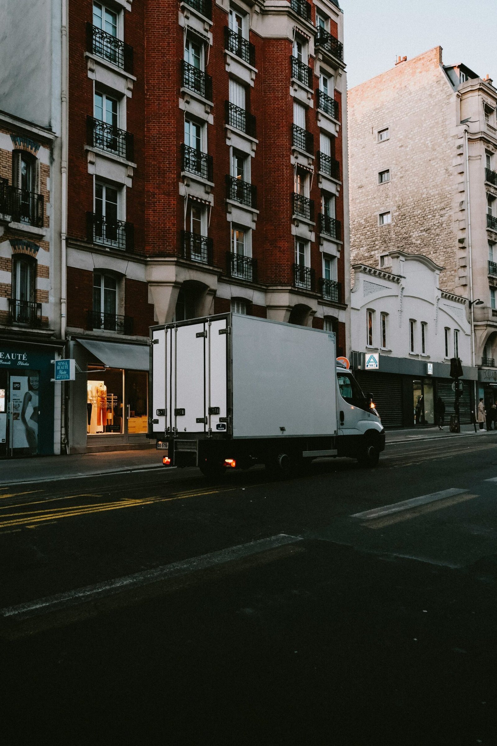 White box delivery truck representing wholesale frozen dog food transportation and commercial delivery logistics
